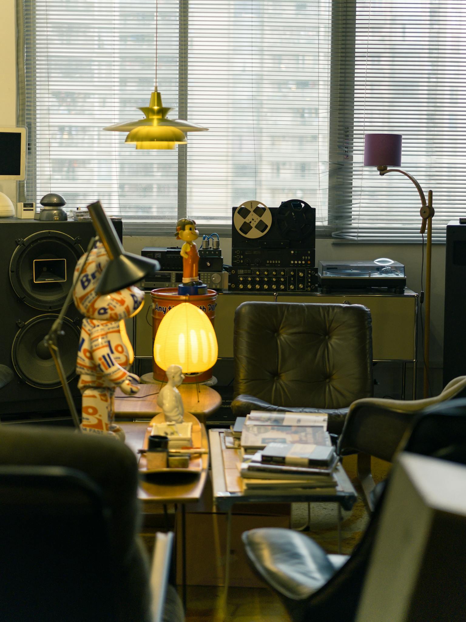 A cozy indoor setting featuring retro decor with warm lighting and vintage accessories.